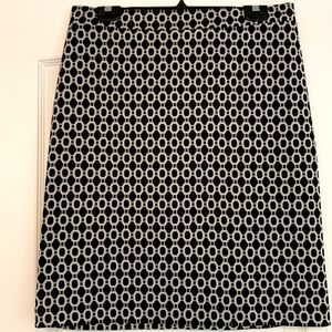 Women’s skirt, black and white classic pattern.